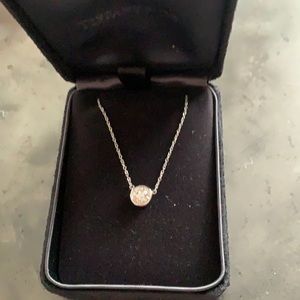 Tiffany & Co platinum and diamond pendant by Elsa Peretti.